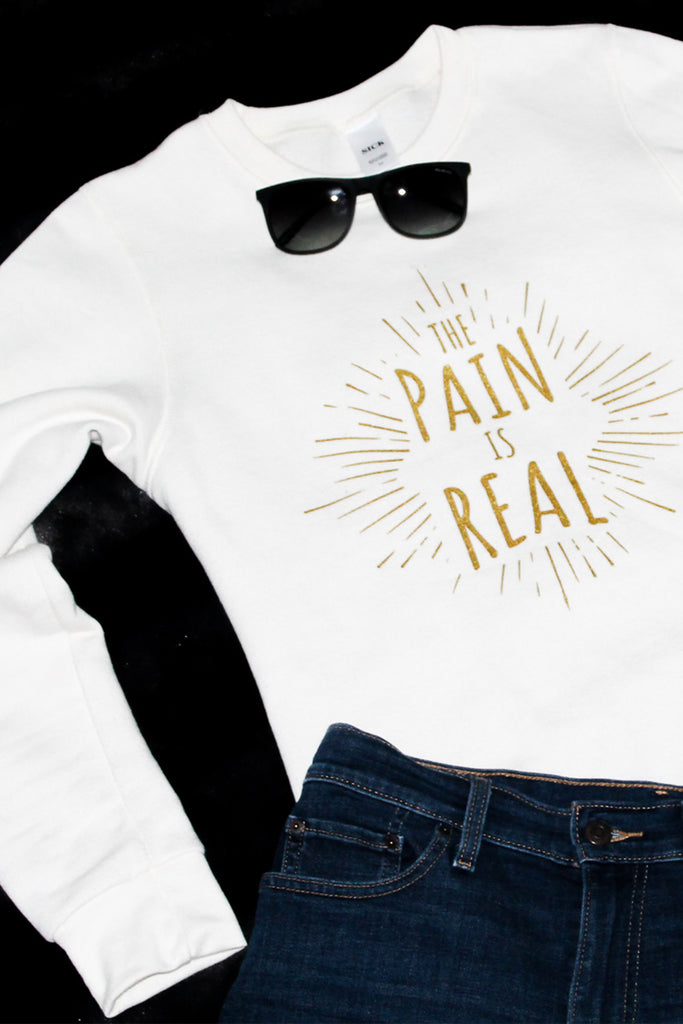 The Pain is Real crewneck sweatshirt. Chronic illness clothing. Fibromyalgia, chronic fatigue syndrome. Pretty Sick Designs.
